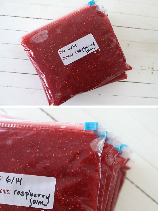 Raspberry jam in a quart size freezer bag labeled with the date