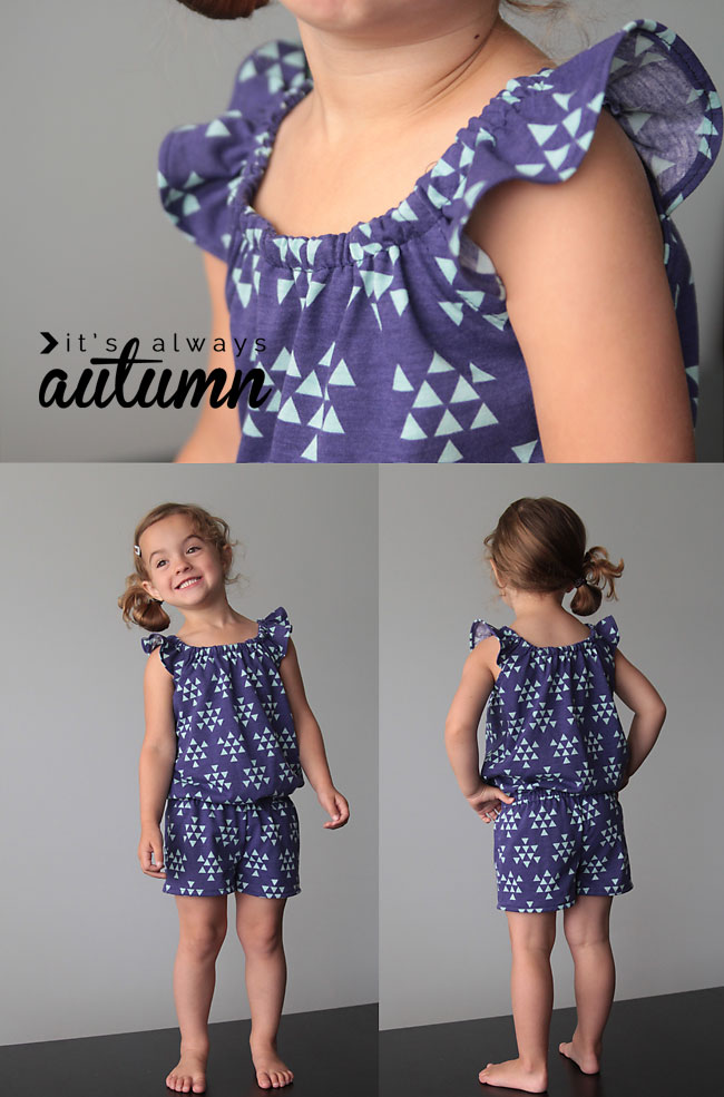 A little girl wearing a blue flutter sleeve romper