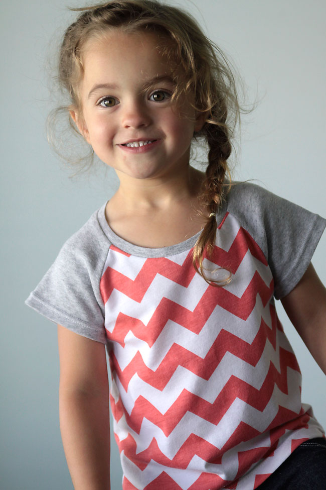 Girl wearing a raglan sleeve t-shirt