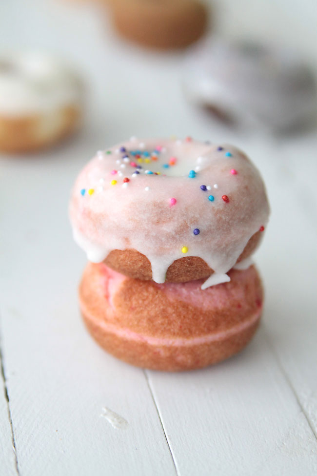 Two strawberry baked donuts