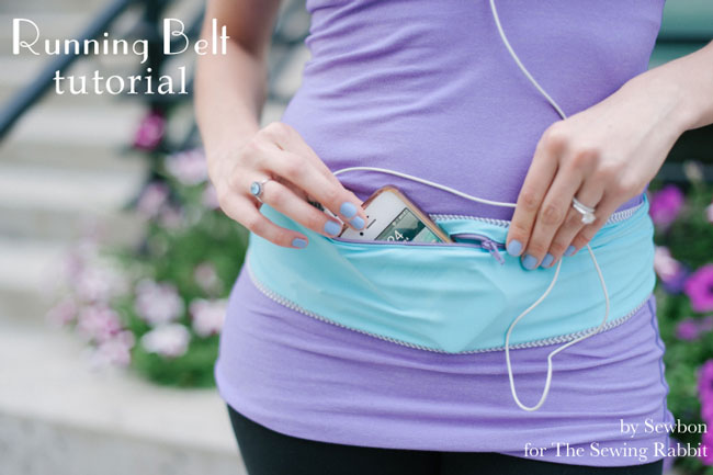 woman wearing a running belt with her phone in it