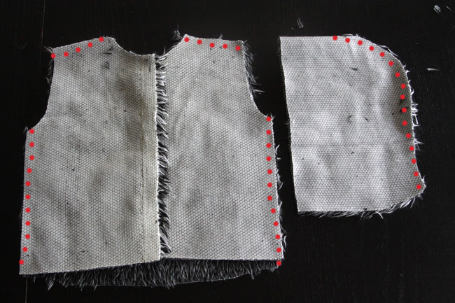 vest with shoulder and side seams marked; hood with seam marked
