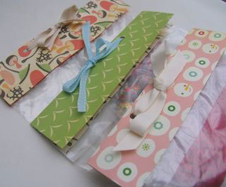 ziplock bags topped with pretty paper and ribbon