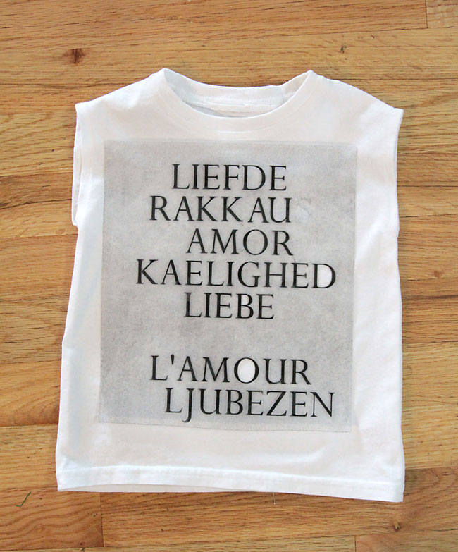 vinyl words placed on the front of a t-shirt