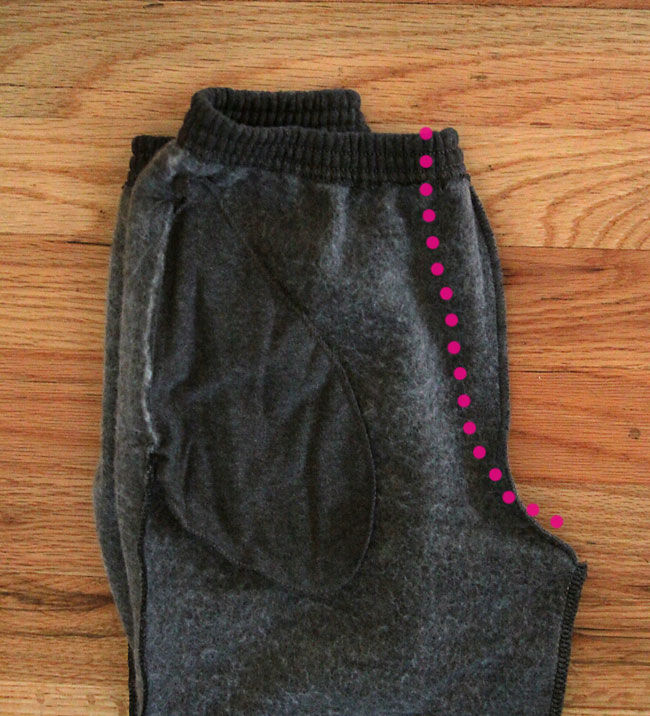 A pair of sweatpants turned inside out with the front center seam marked to give it a slimmer fit