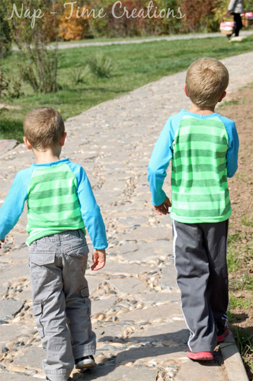 Two young boys wearing raglan t-shirts made from a free sewing pattern