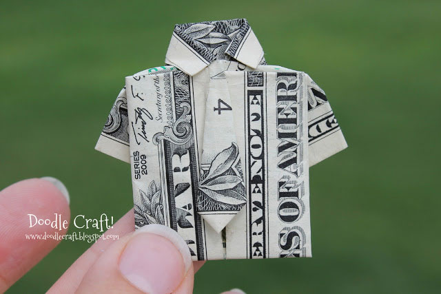Dollar bill folded to look like a shirt and tie
