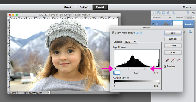 Adjusting the brightness of a photo with the levels menu in Photoshop Elements