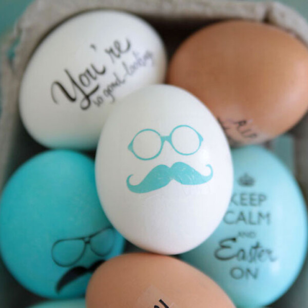 Easter eggs decorated with image of glasses and mustache