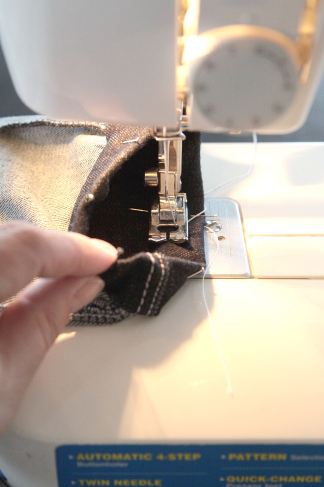 Sewing jeans hem on a sewing machine