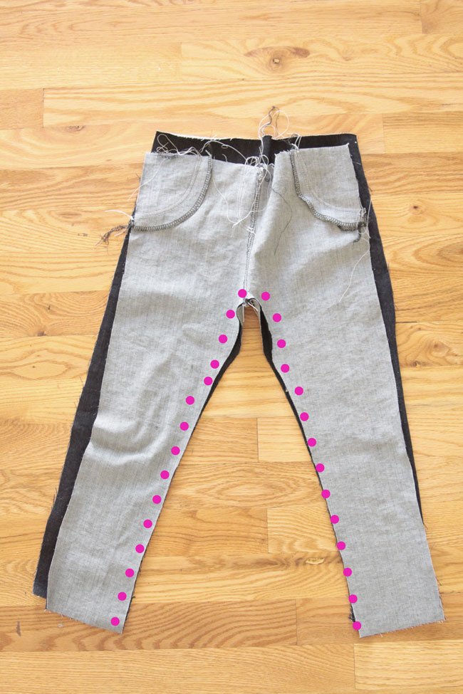 Skinny jeans front and back with inner leg seams marked