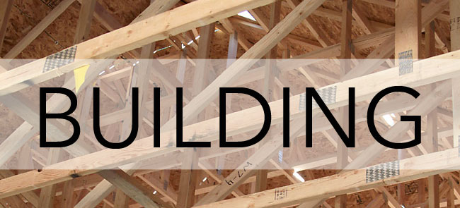 A close up of a framed house roof