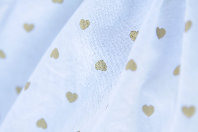 gold heart polka dots on fabric 