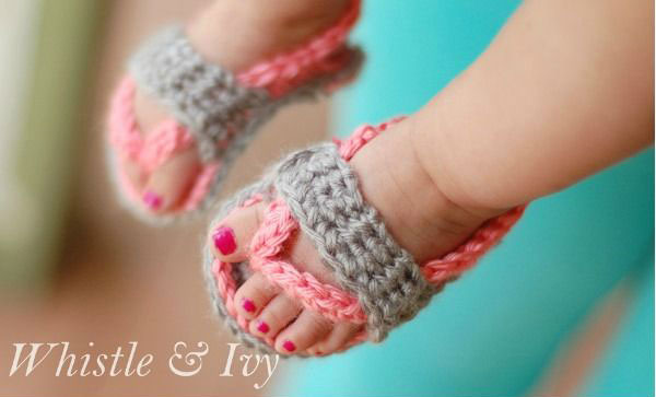 Baby feet with crocheted sandals