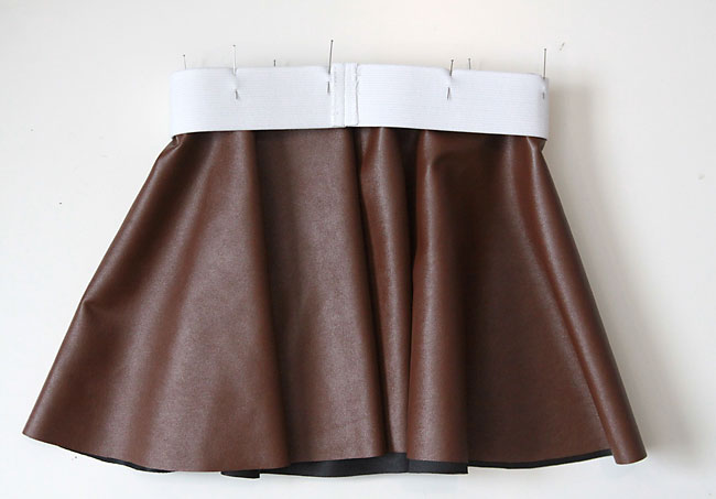 Elastic pinned over waist of skirt