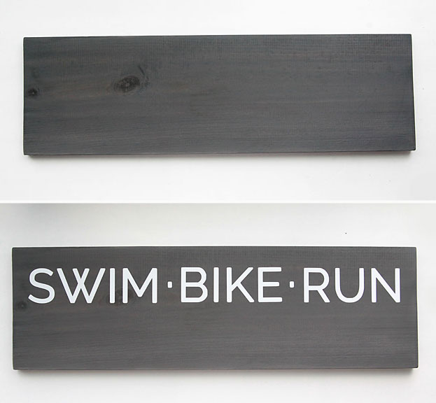 Wood board with vinyl words swim bike run transferred onto it