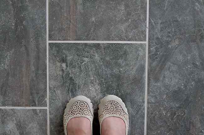 Shoes on grey tile