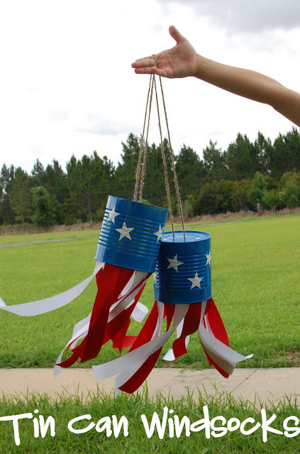 Tin cans painted blue with white stars and red and white streamers