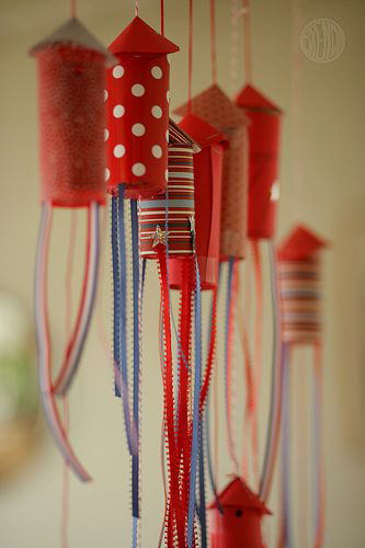 Red and blue rockets made from cardboard tubes craft for kids