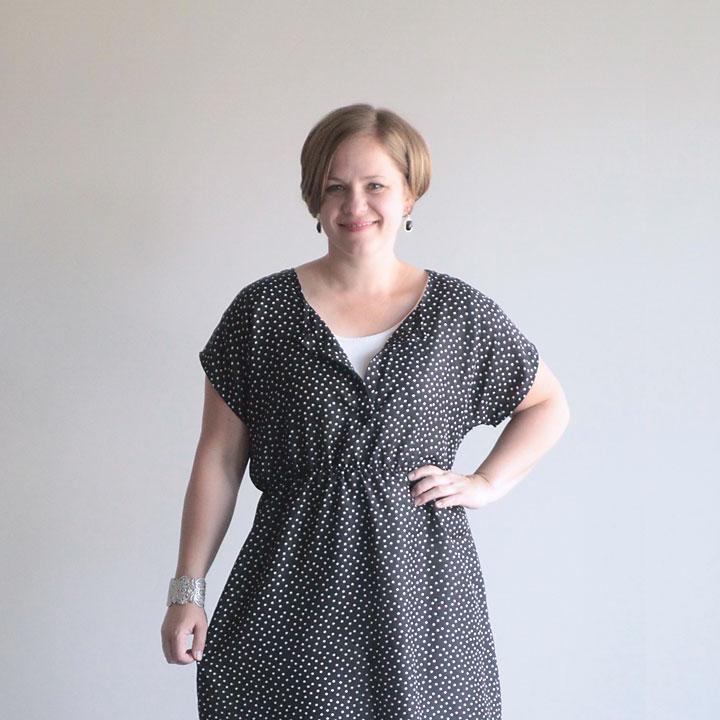 A woman wearing a dress made from a t-shirt pattern