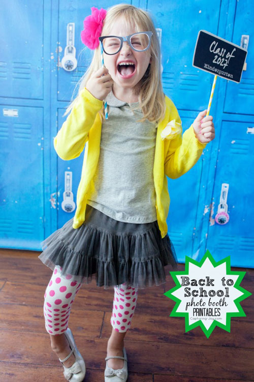 Girl holding class of 2027 sign