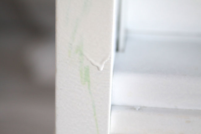 paint dripping down piece of wood