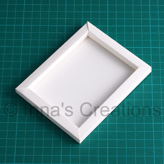 Dimensional Picture frame folded from paper