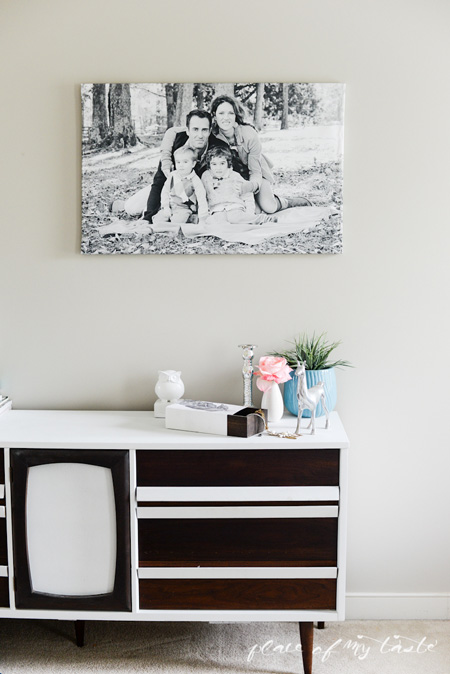 Large wrapped canvas family photo hanging on a wall