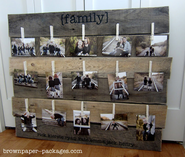 Photo display made from wood strips with clothespins to hold pictures