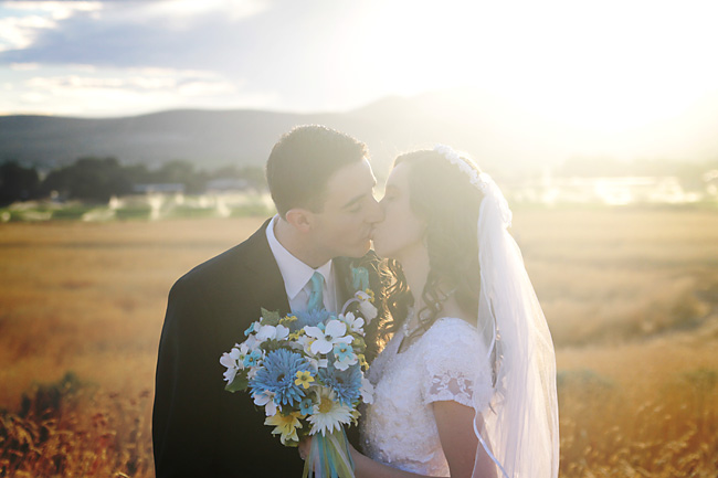 Bride and groom kissing