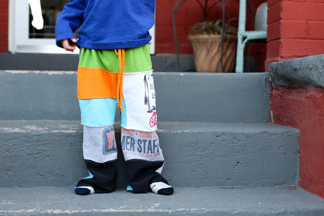 A boy in pajama pants made from t-shirts