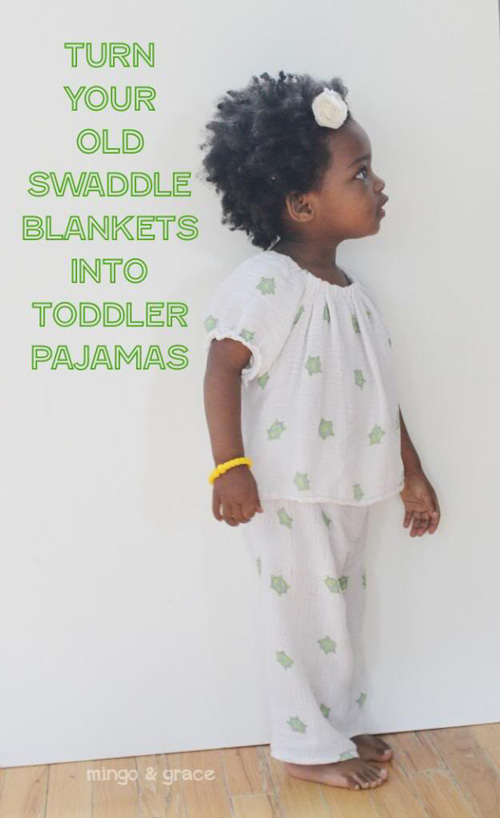 A little girl wearing pajamas made from swaddle blankets