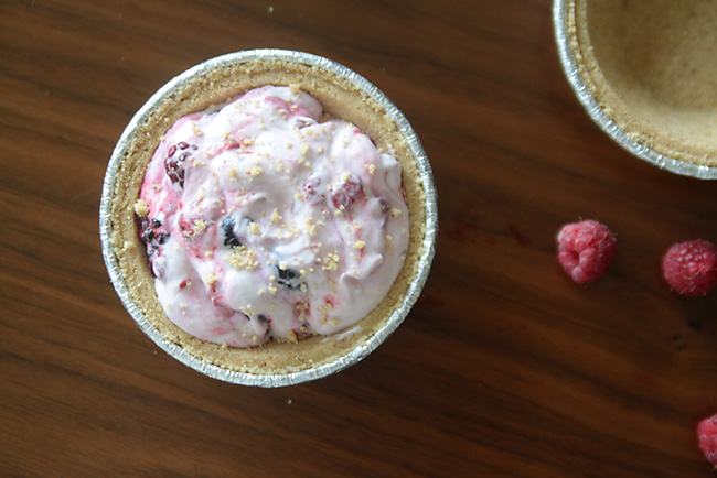 Berry cheesecake fluff in a mini graham cracker crust