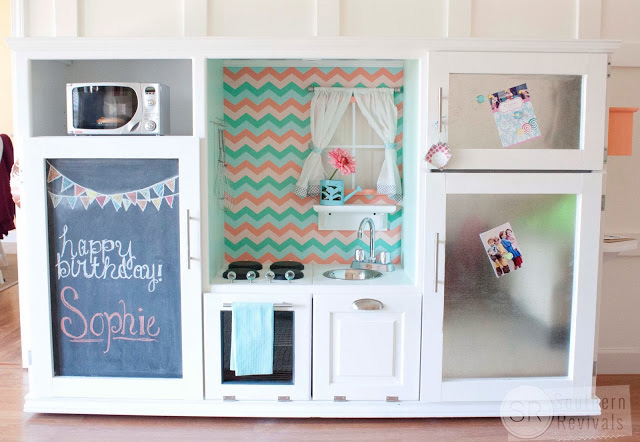 Play kitchen made from an old entertainment center