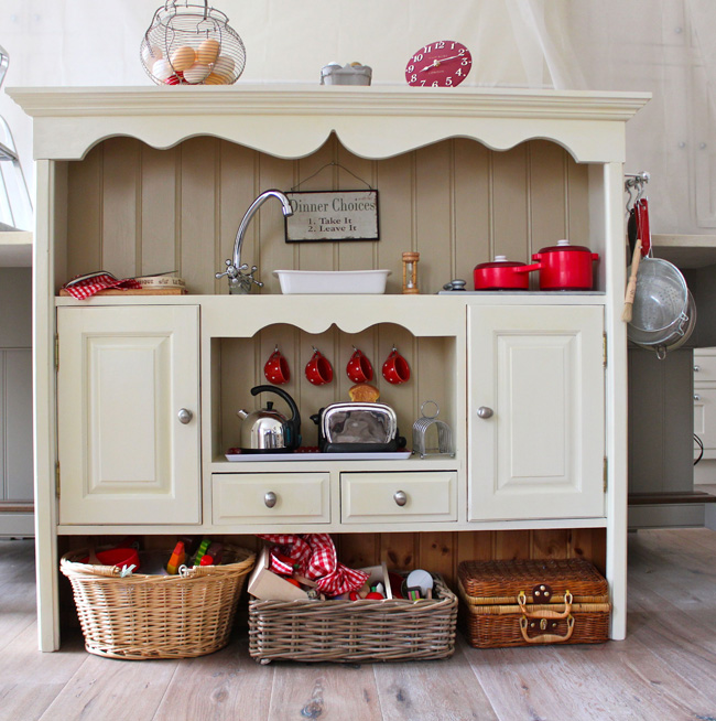 Play kitchen made from an old dresser with top drawer removed