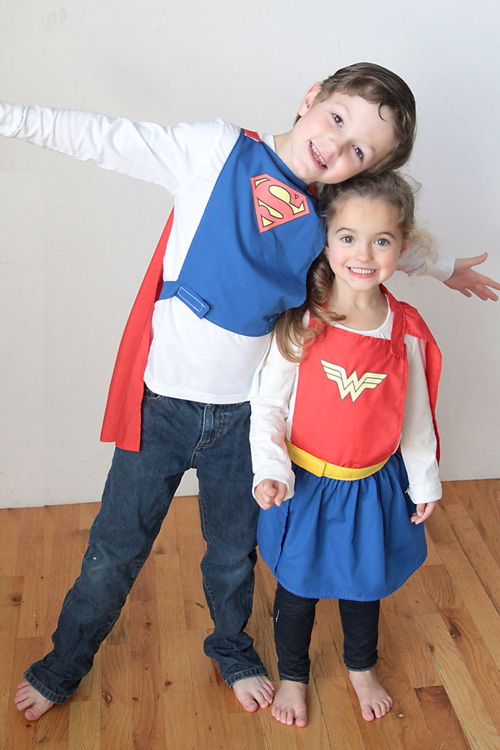 Things to sew for kids: kids wearing superman and wonderwoman capes