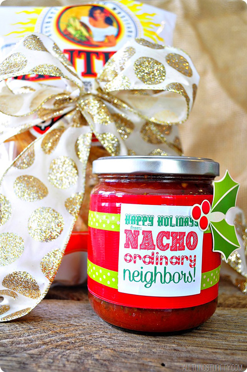 Chips and a jar of salsa with tag saying Happy Holidays nacho ordinary neighbors!