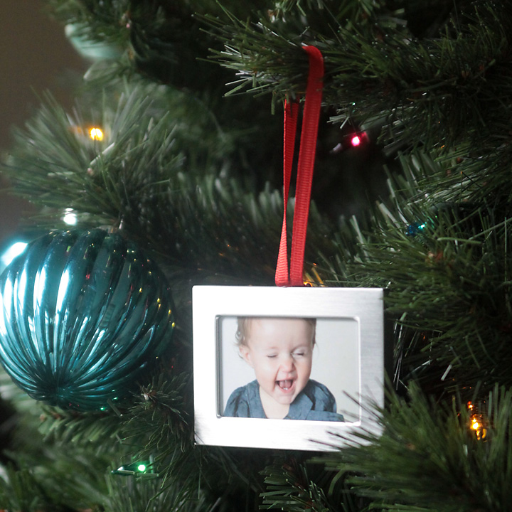 DIY photo Christmas ornament on a tree