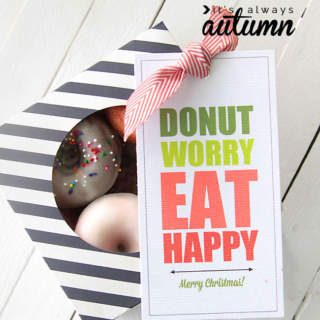 Donuts in a box with tag that says Donut worry Eat Happy