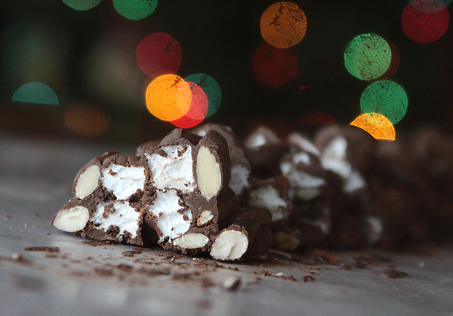 A piece of rocky road - chocolate covered almonds and marshmallows