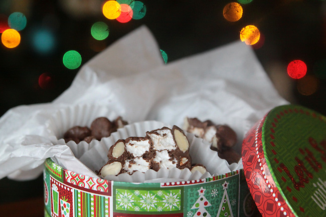 Pieces of rocky road candy in a Christmas tin