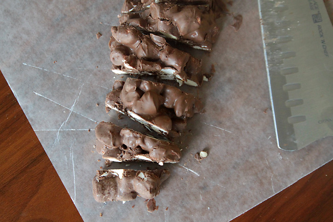 Cooled log of candy cut into slices