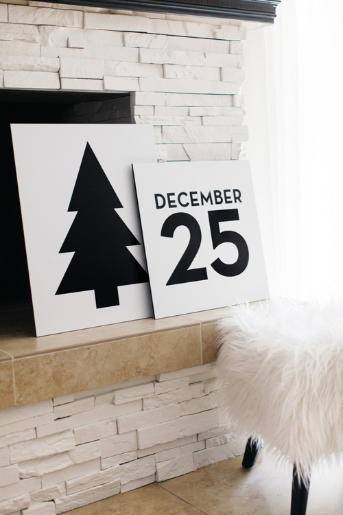 Wood signs that say December 25 and have Christmas tree silhouette