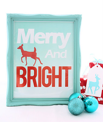 Print that says Merry and Bright in a turquoise frame