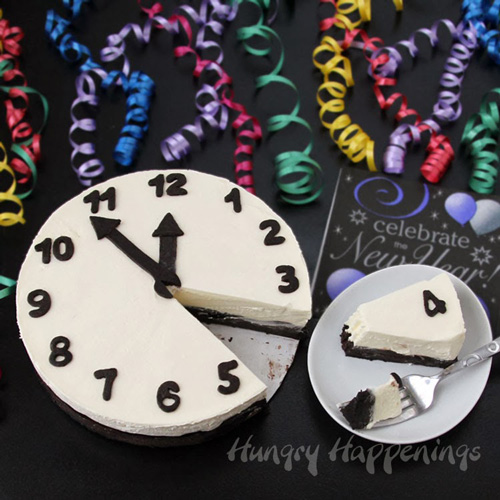 Cheesecake decorated to look like a New Year\'s Eve countdown clock