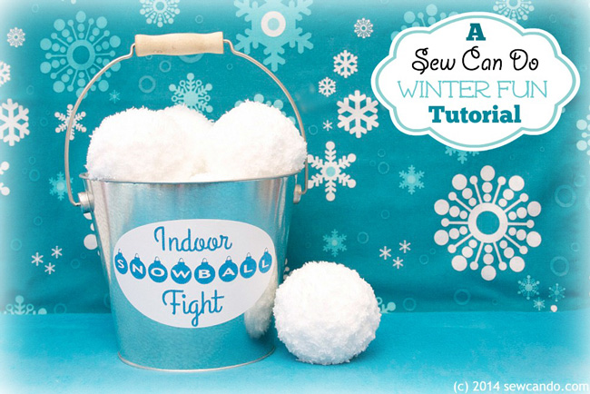 Bucket with white pompoms made to look like indoor snowballs