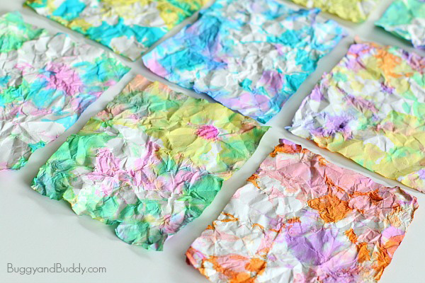 Crumpled paper colored with watercolor paints art project for kids
