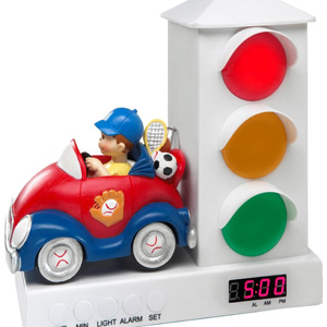 An alarm clock shaped like a stoplight with a toy car