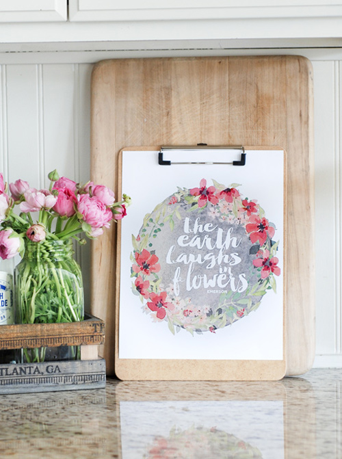 Floral art print with quote that says the earth laughs in flowers