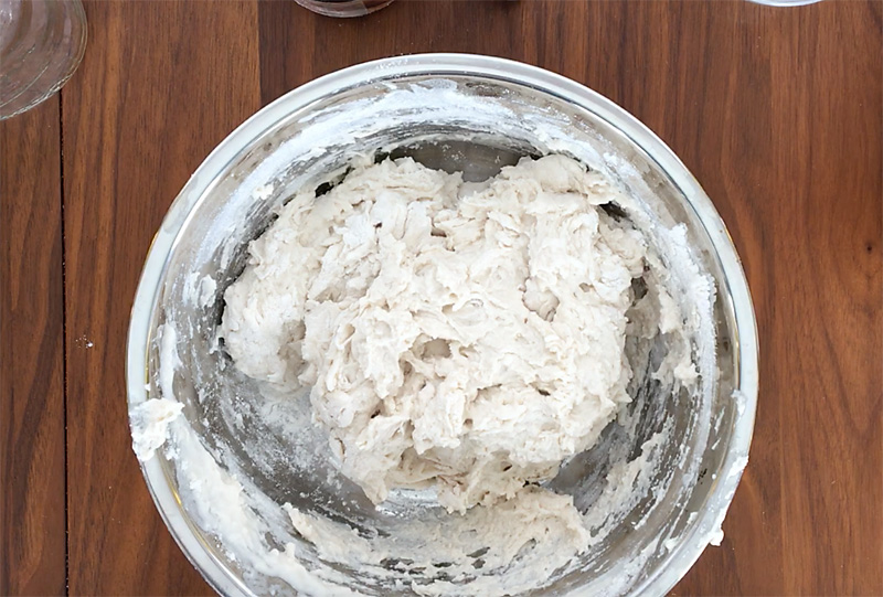 Wet bread dough in a bowl